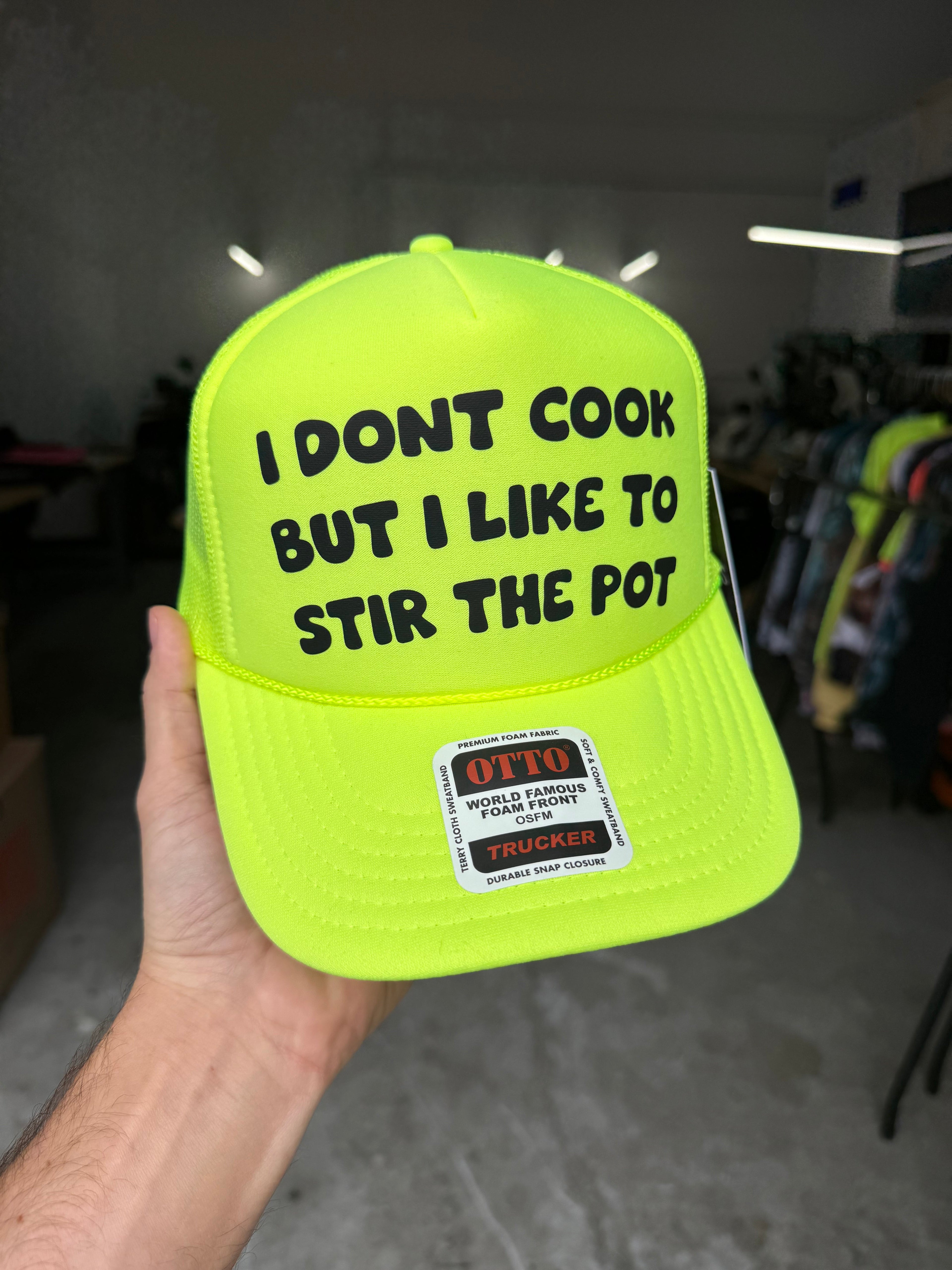 I Don't Cook But I Like to Stir The Pot Trucker Hat