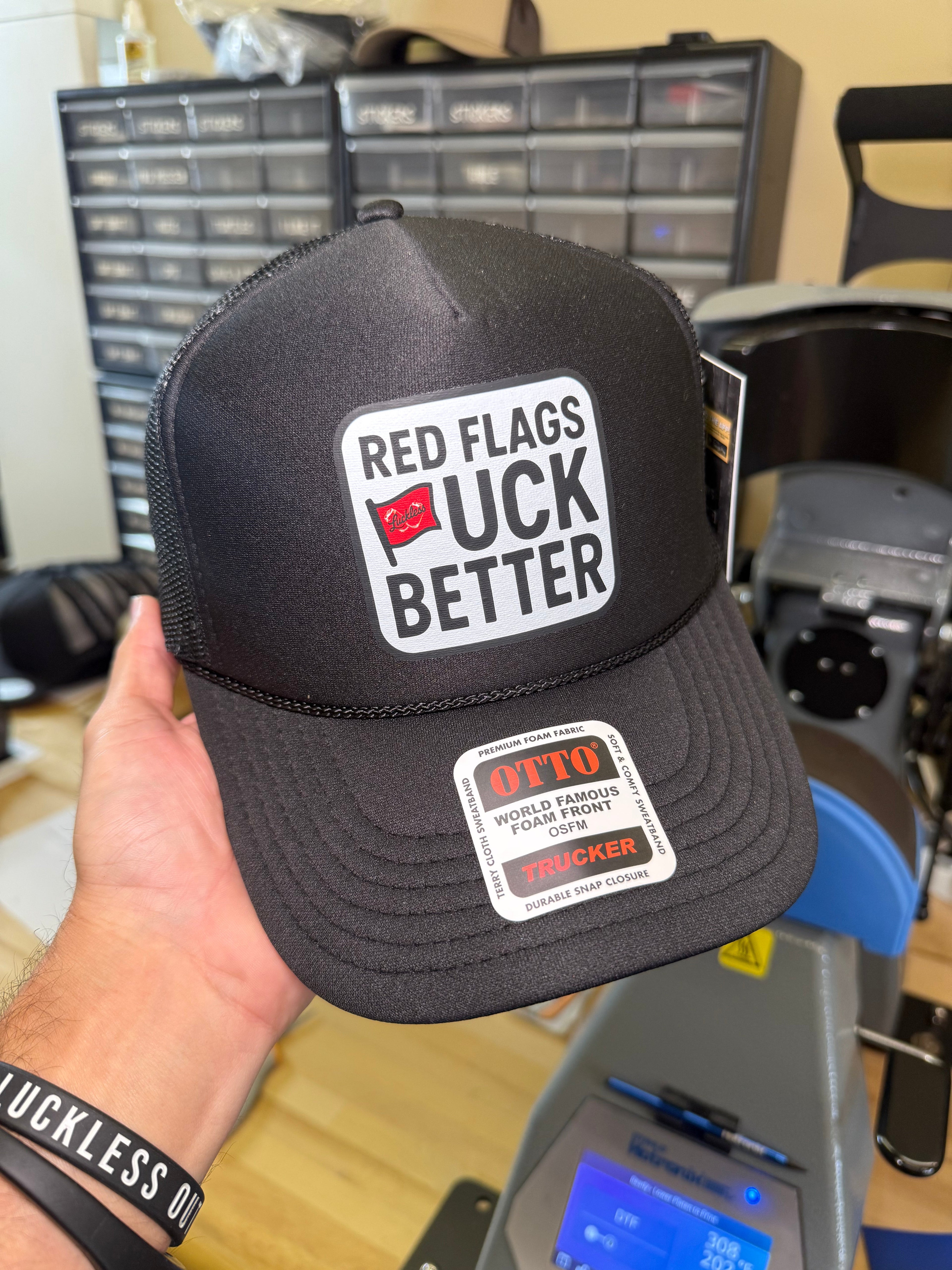 Red Flags Fuck Better Trucker Hat