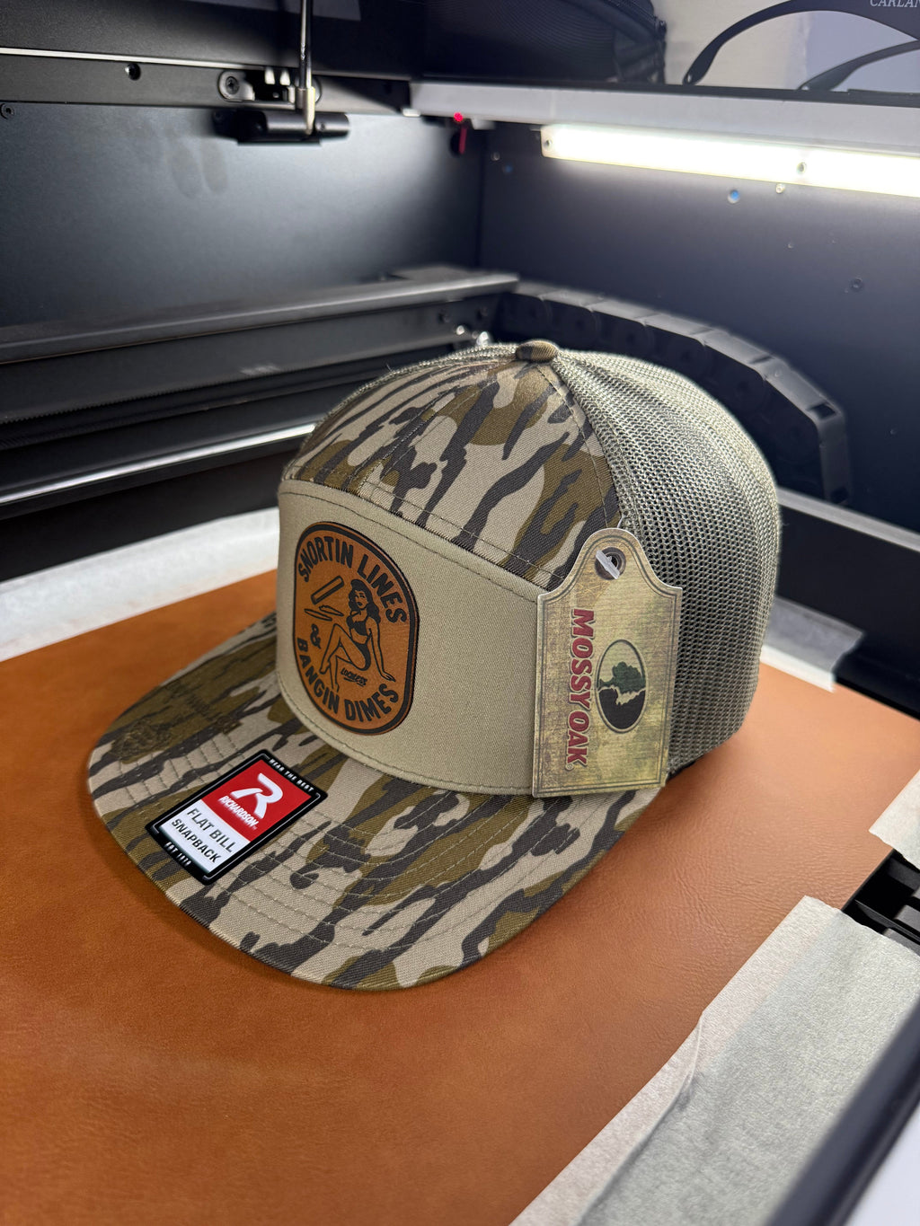 Lines and Dimes | Rawhide Leather Patch Hat Mossy Oak Camo